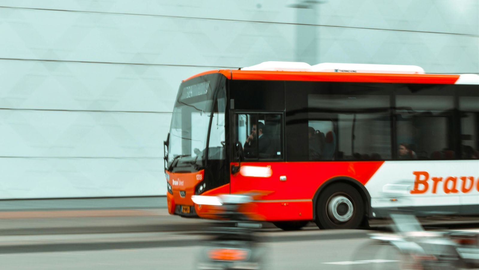 A bus running on a road