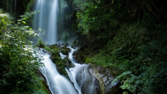 Beautiful cascade nestled in greenery