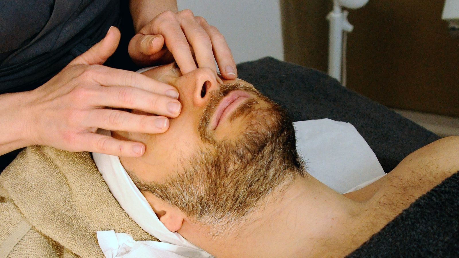 A person getting a face massage