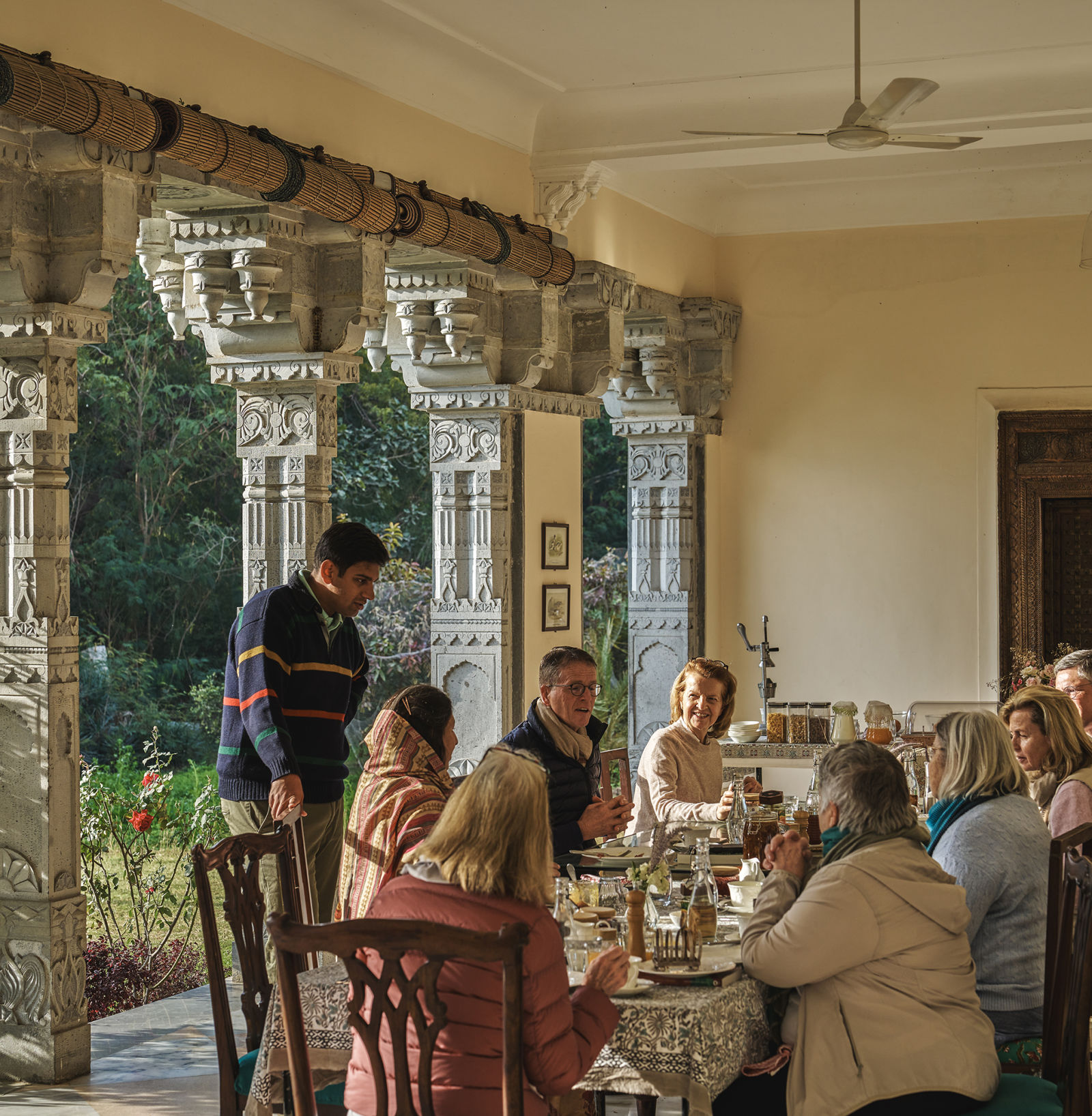 an image of a group of people having lunch at Dev Shree, Deogarh