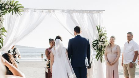 A couple walking down the isle for the wedding ceremony