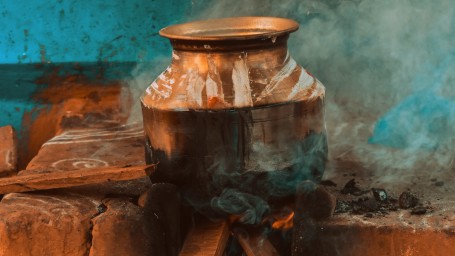 Pongal pot on woodsticks