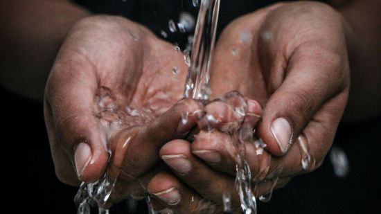 person washing hands