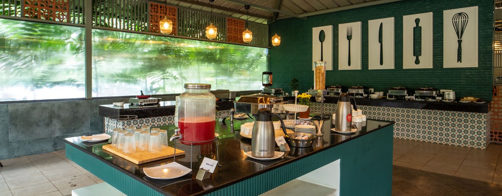 An image of the dining area with open wall arrangement - Trance Veechika Resort, Vikarabad