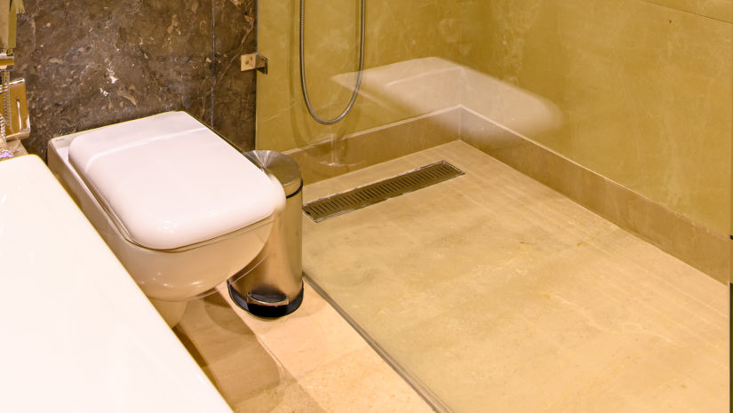 The interiors of a bathroom with a shower cubicle of one of the rooms in Pushkar at our 5-star resort 78