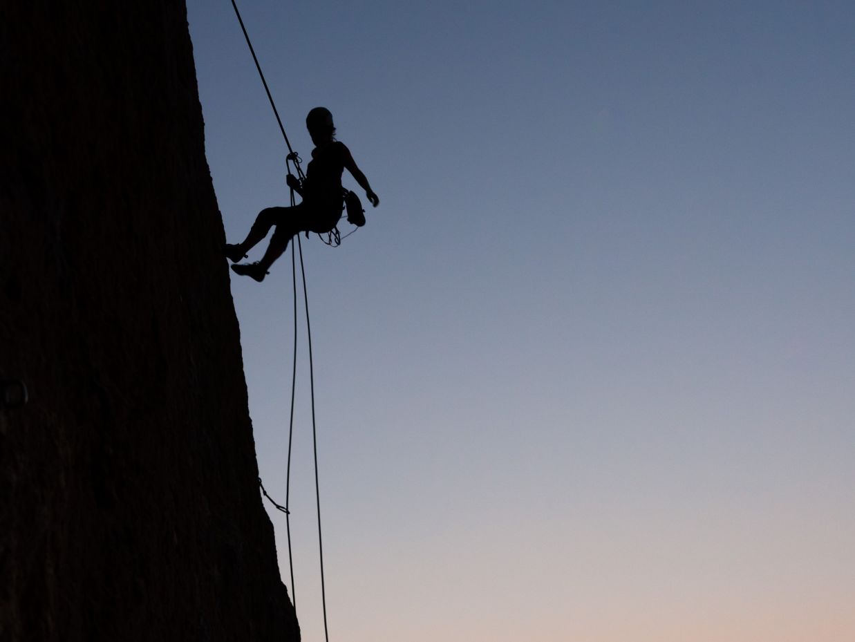 man doing rock climbing