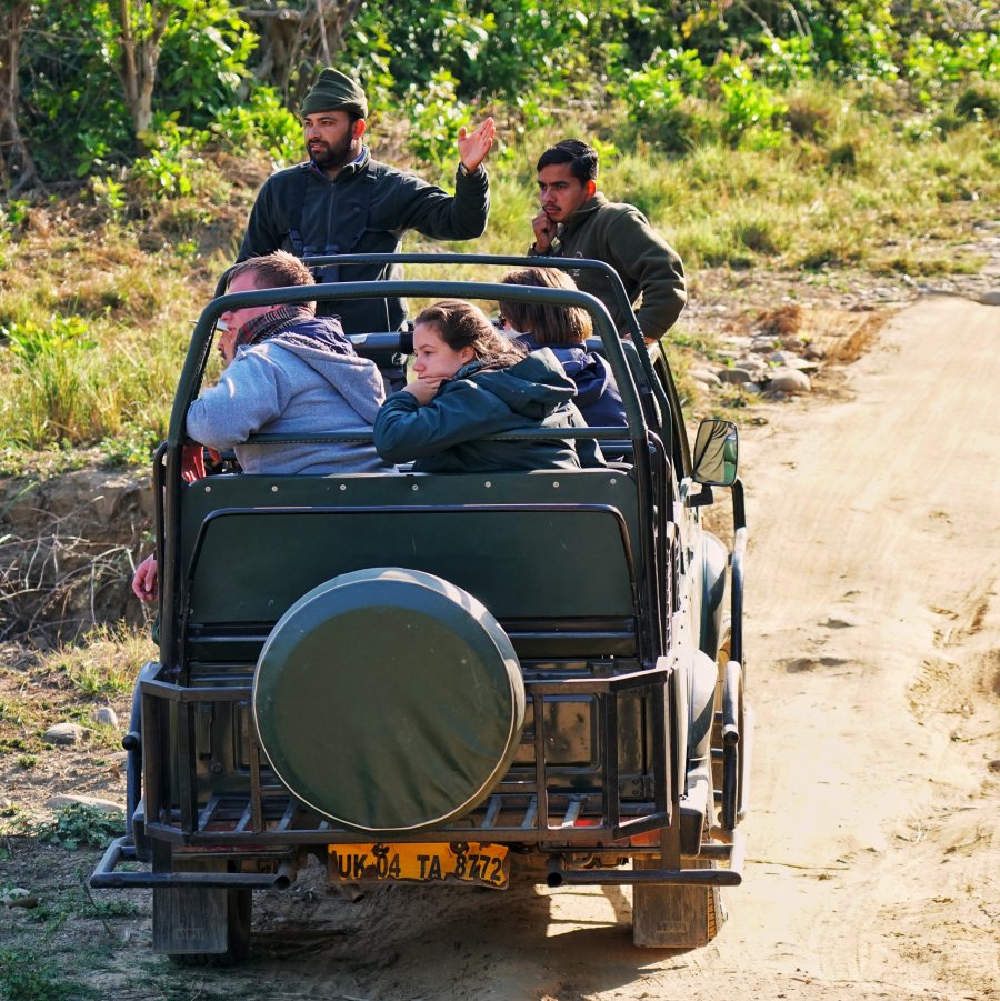 People on a jeep during Safari- The Golden tusk