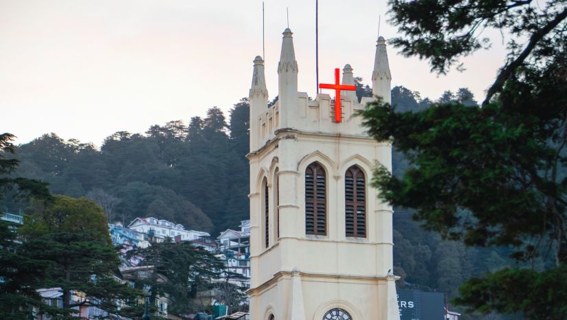 Facade of a church in Shimla with trees in the background