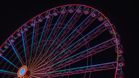 a picture of a ferris wheel at night