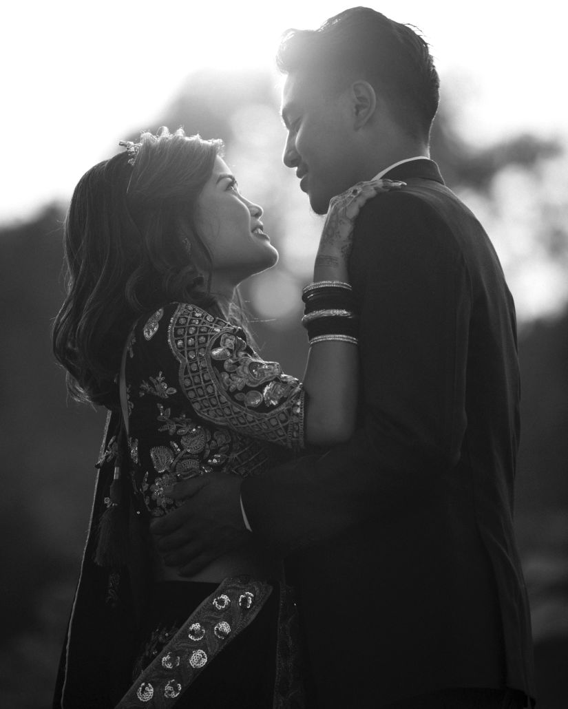 a black and white picture of a couple posing 