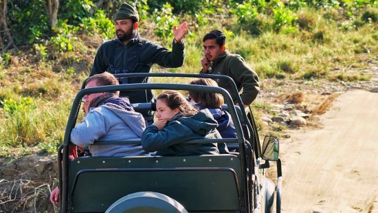 People on a jeep during Safari- The Golden tusk