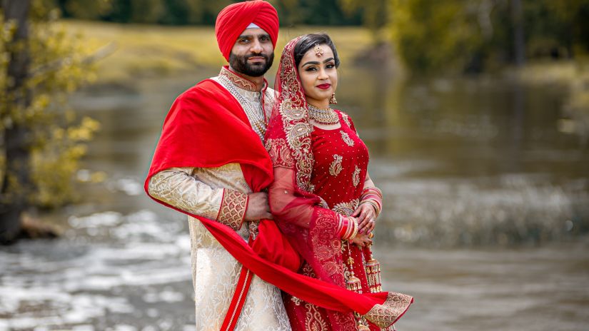 a bride and a groom posing for a photoshoot