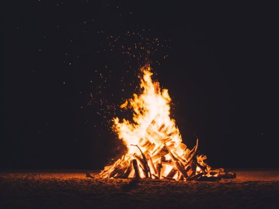 a shot of a campfire during night time