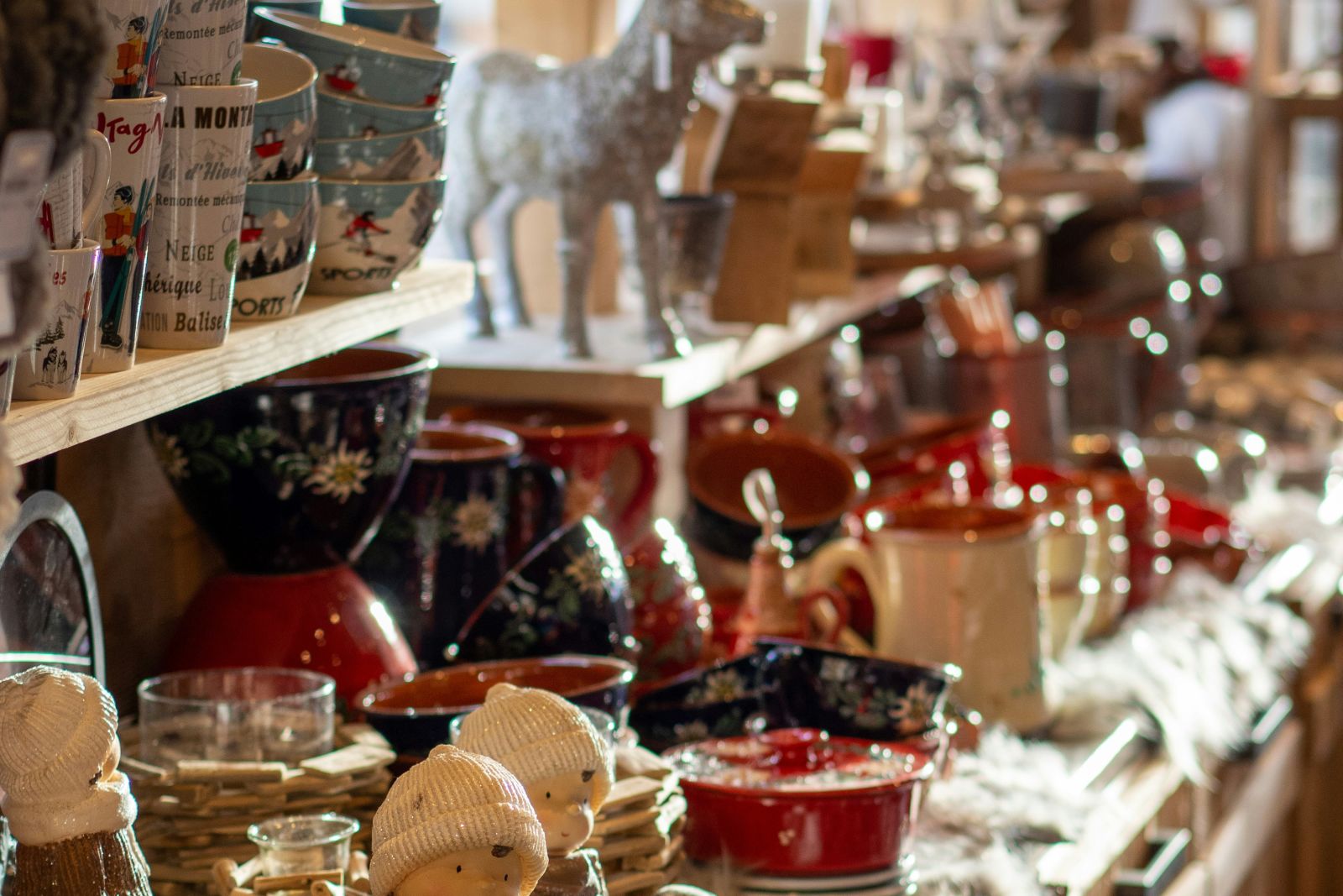 A cosy assortment of winter-themed kitchenware and decor on display