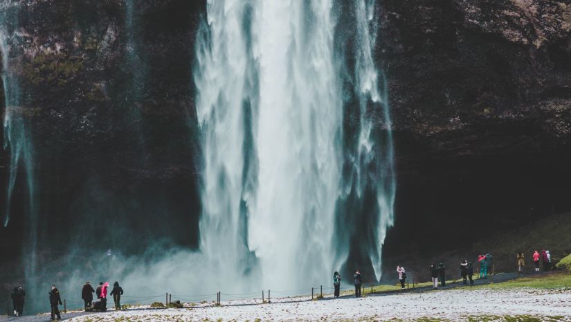 a waterfall cascading down a hill