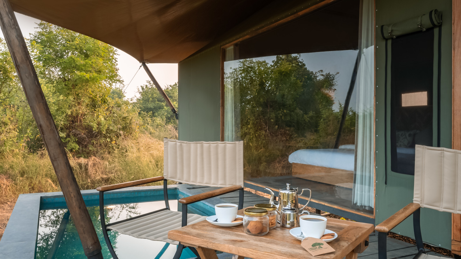 dining setup in a tent at Trees N Tigers Tadoba