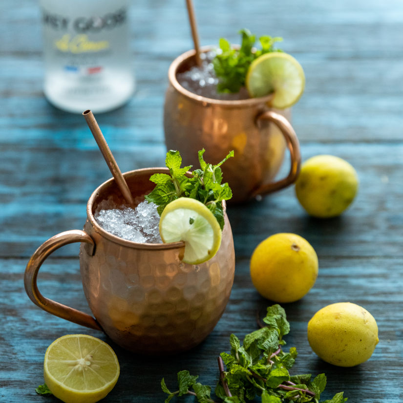 lemonade in two copper glasses