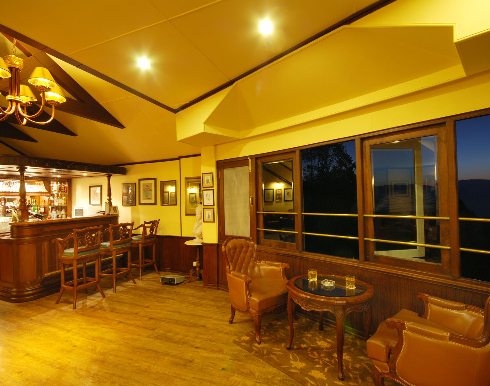 indoor seating space at the bar - Mayfair Hill Resort, Darjeeling 1