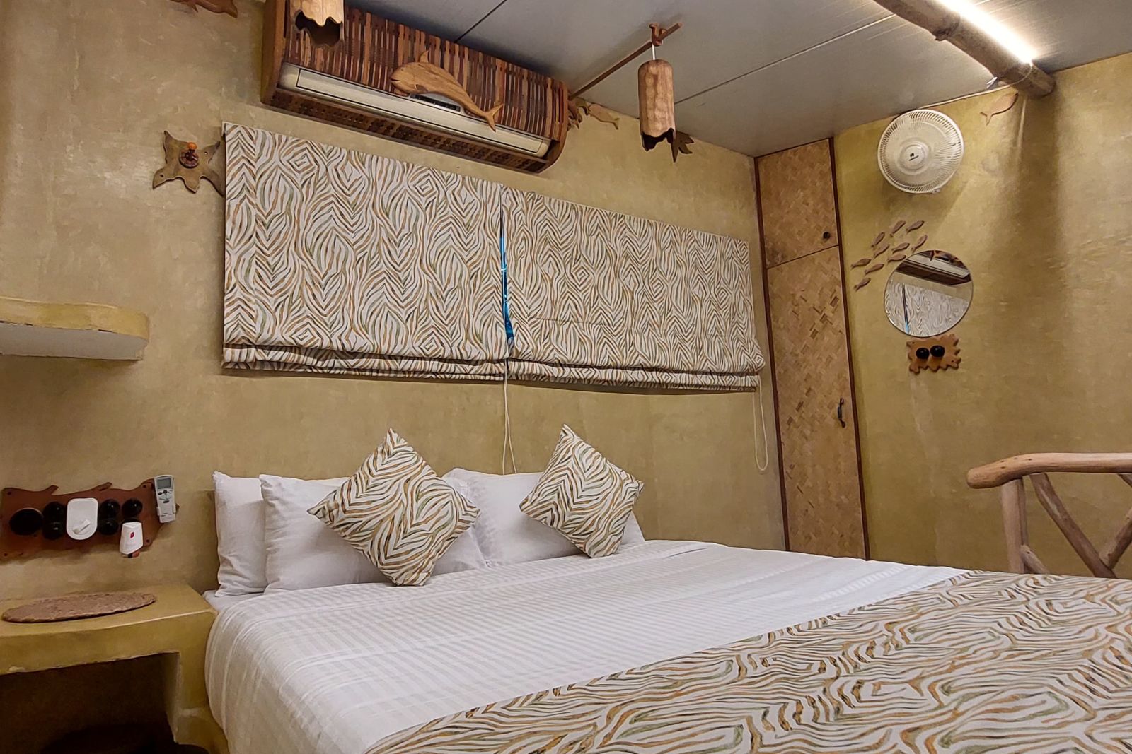 Bed with bedding in the room | Matsya Island Retreat