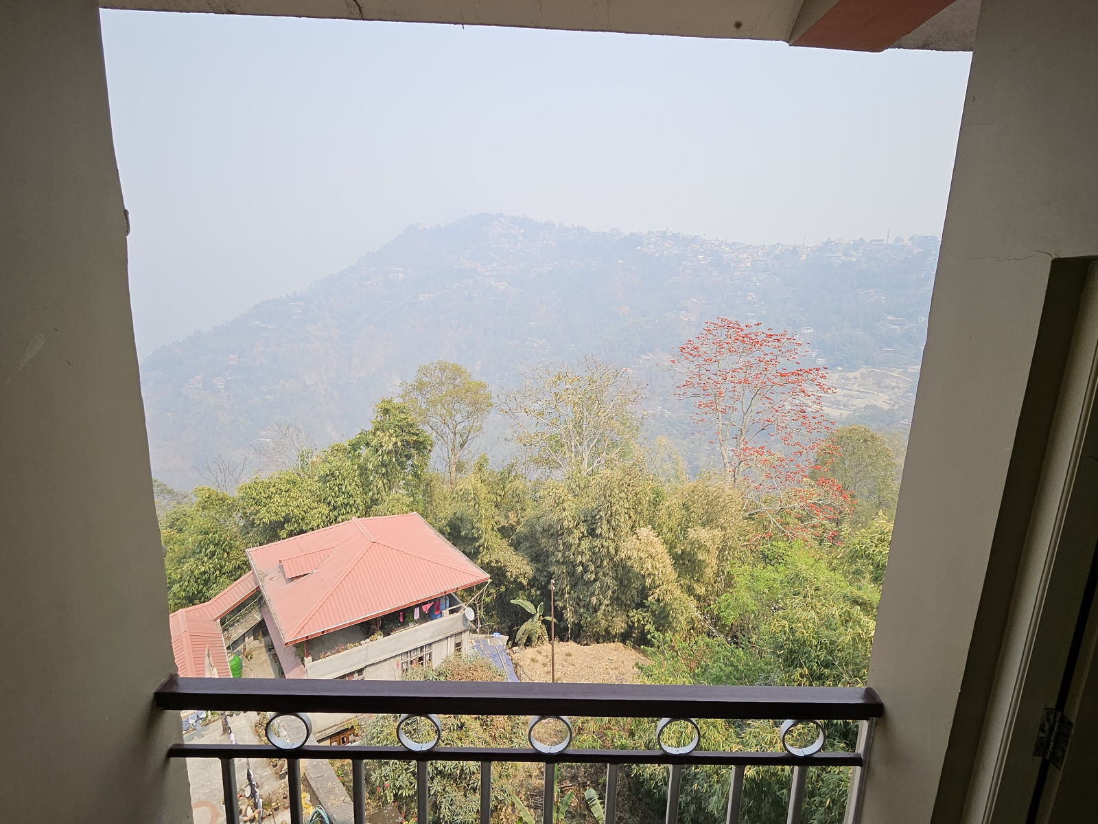 view of mountains in the distance from a balcony of our hotel