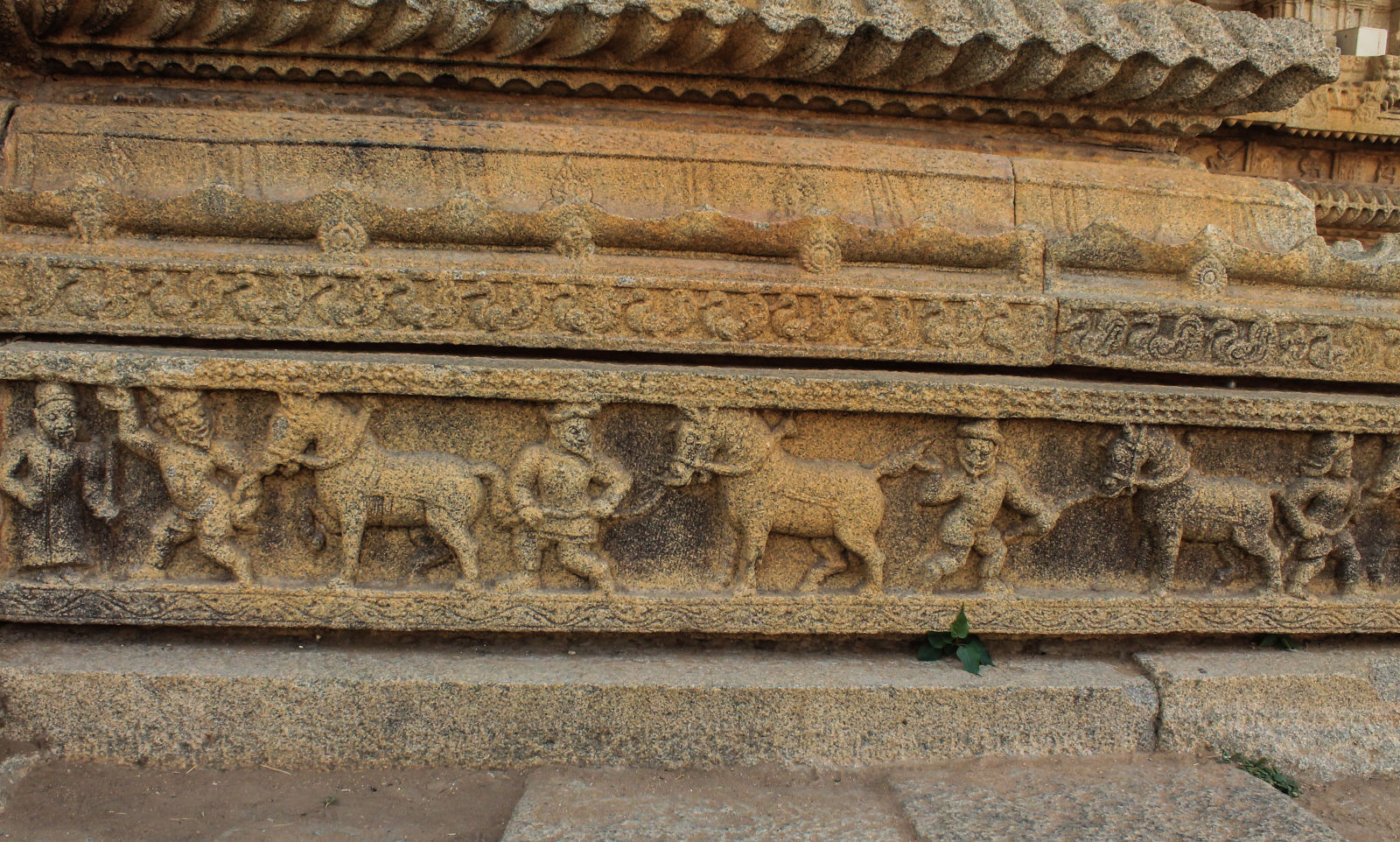 carvings of merchants Vitthala Complex