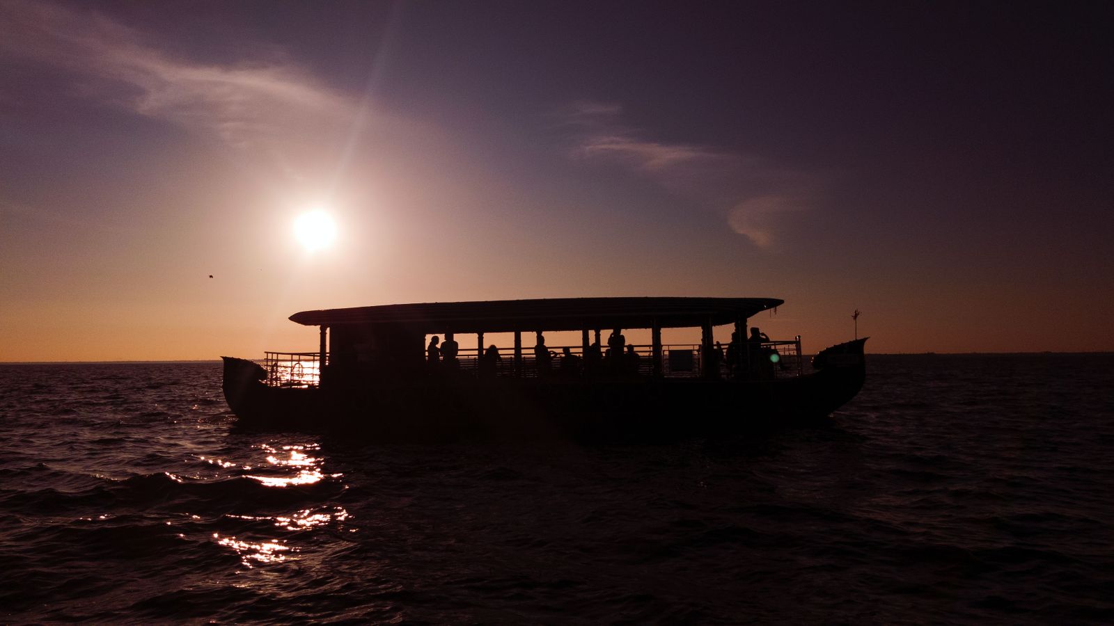 a houseboat on a lake