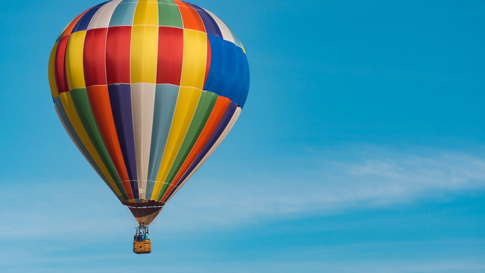 a hot air balloon floating in the sky