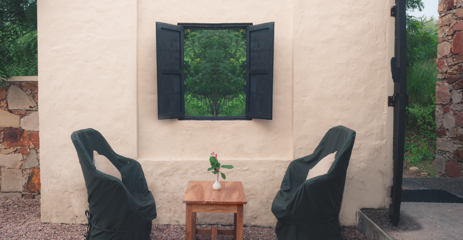 The outdoor sitting space in the cottages at our lodge in Sariska - Trees N Tigers, Sariska