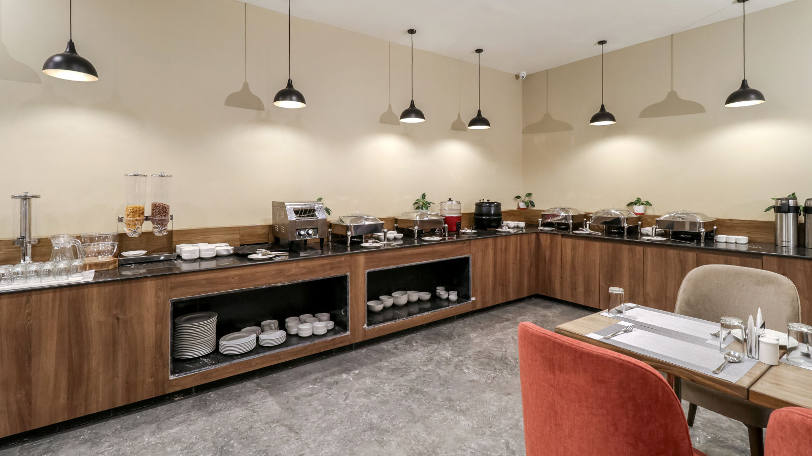 Far view of the buffet section inside Gourmet - Starlit Suites Newtown, Kolkata