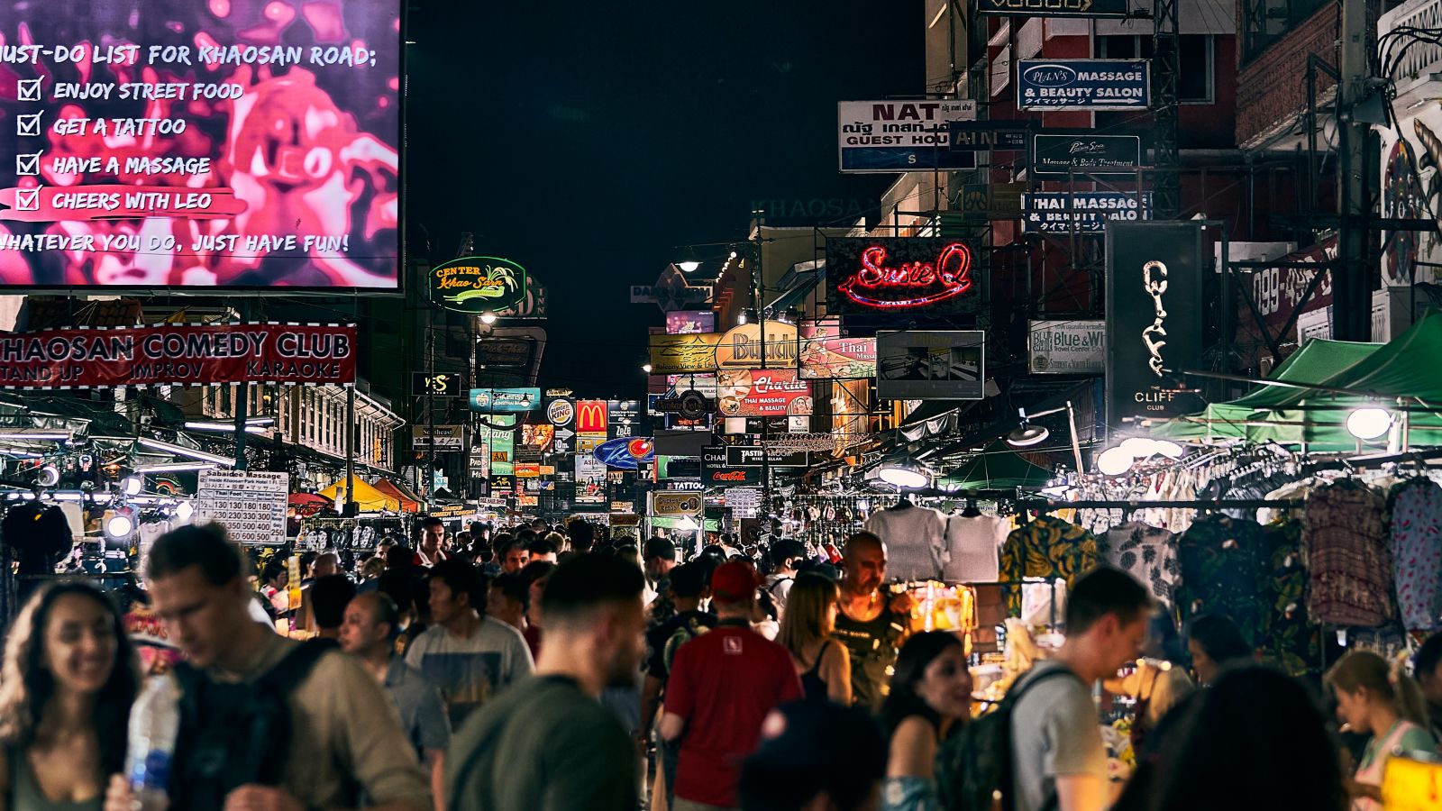 A crowd walking and shopping on the streets of Bangkok