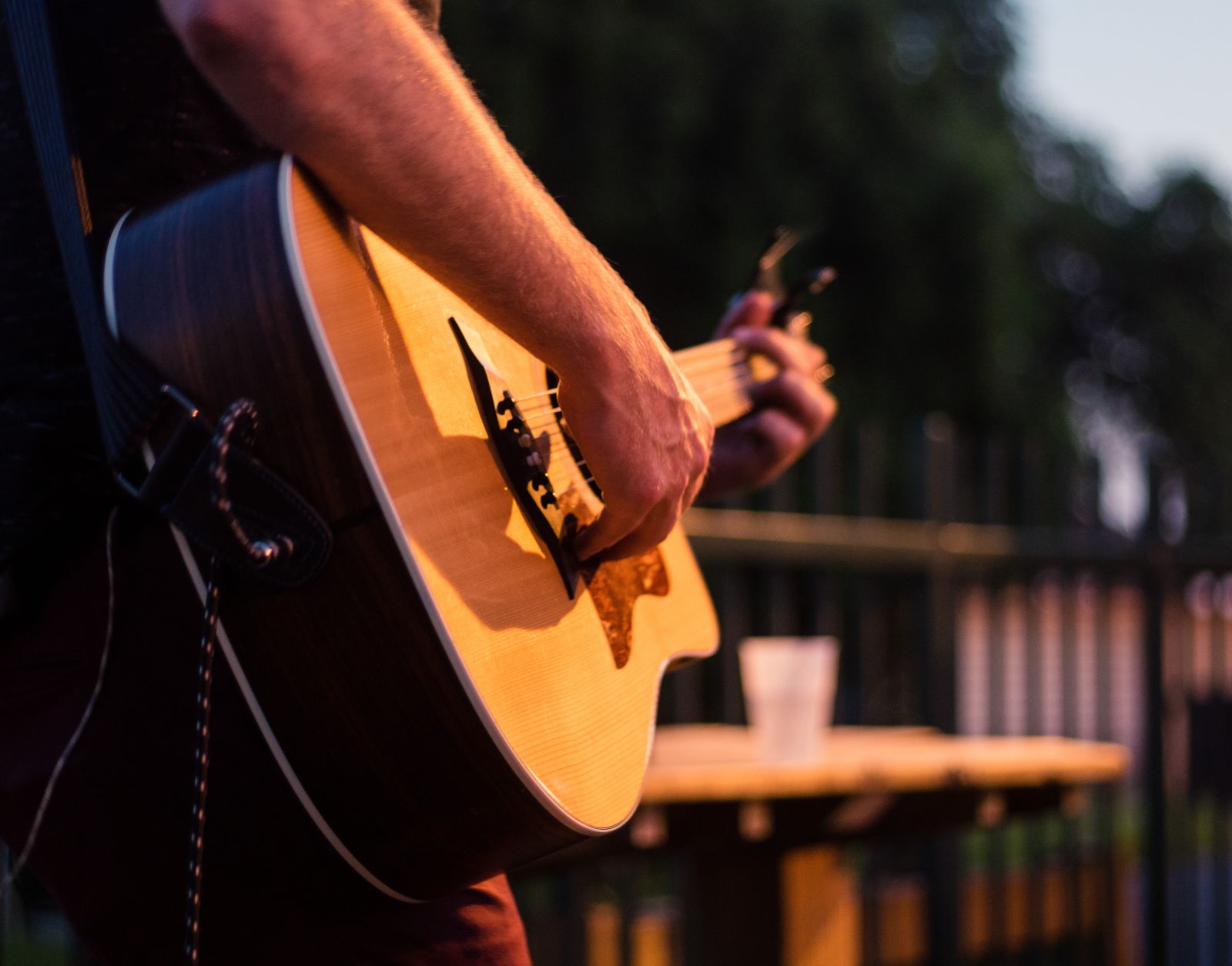 a person holding a guitar