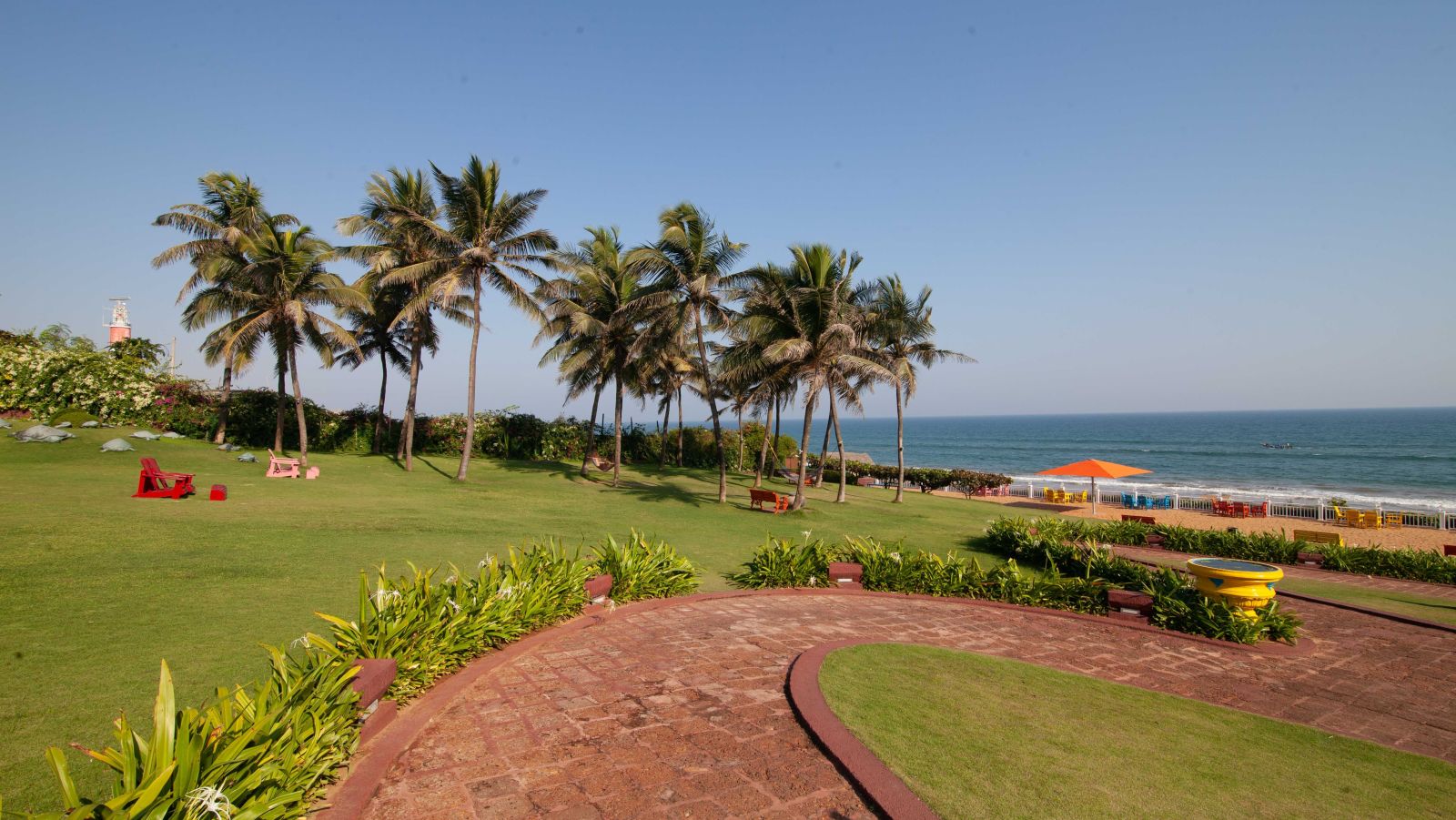 view of the sea and the surrounding lawn - Mayfair Palm Beach Resort, Gopalpur-on-Sea 