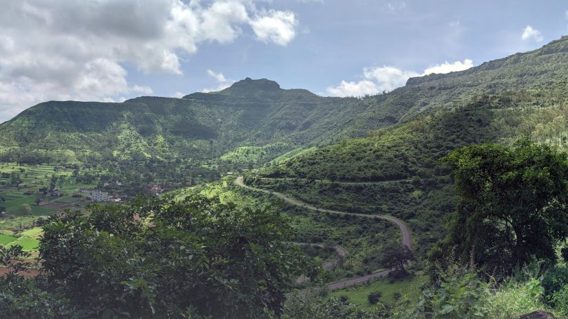 Path to the Purandar fort in Pune amidst lush green mountains -Fort JadhavGADH 