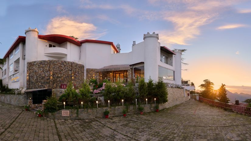 facade of a big white building - Renest Dunsvirk Court Mussoorie