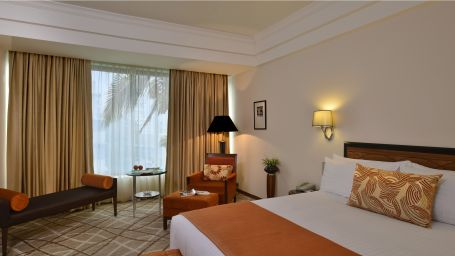 Deluxe suite bedroom at Hotel Marine Plaza Mumbai