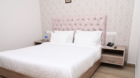 Interiors of the Deluxe room at our hotel in Mandi - Spt Clarks inn Suites Mandi