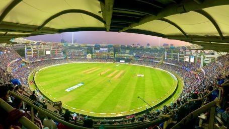 an overview of wankhade stadium with crowd in the seating