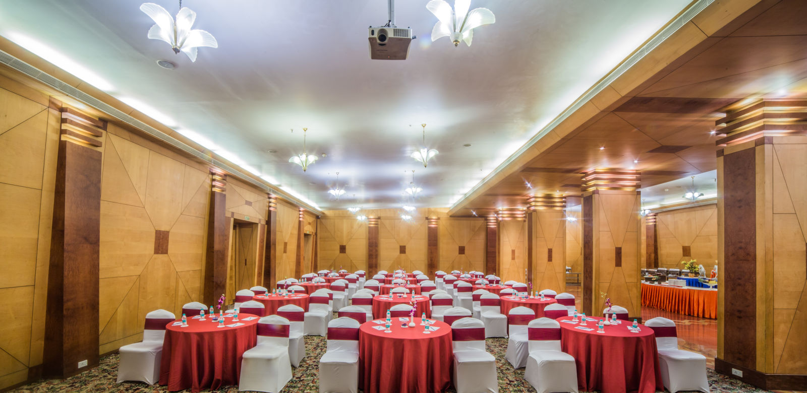 Seating arrangement in Mayfair Hall at Sitara Luxury Hotel