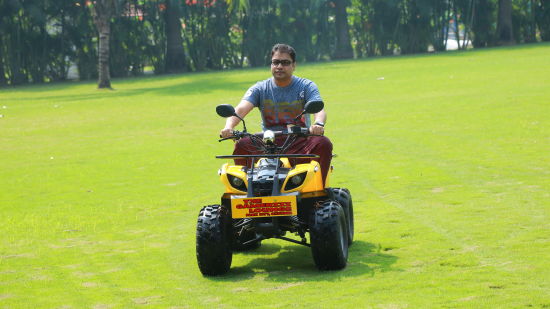 Damanganga Valley Resorts Pvt Ltd - a person riding an ATV bike ride