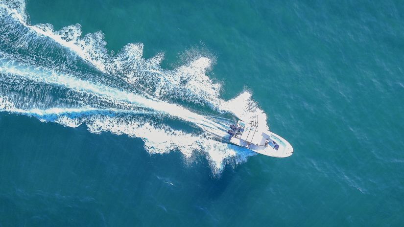 an aerial view of a speed boat