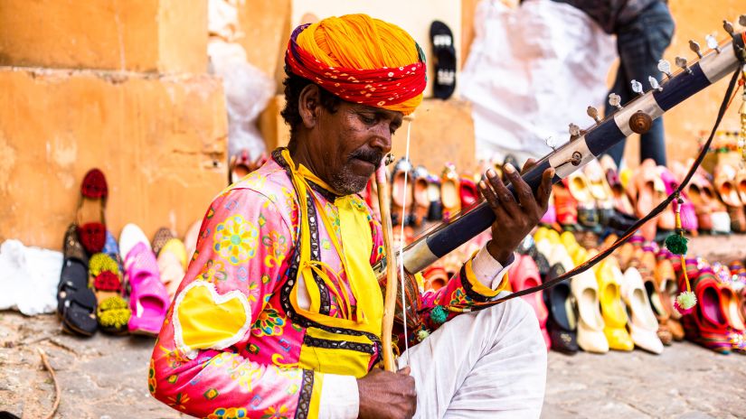 man playing instrument