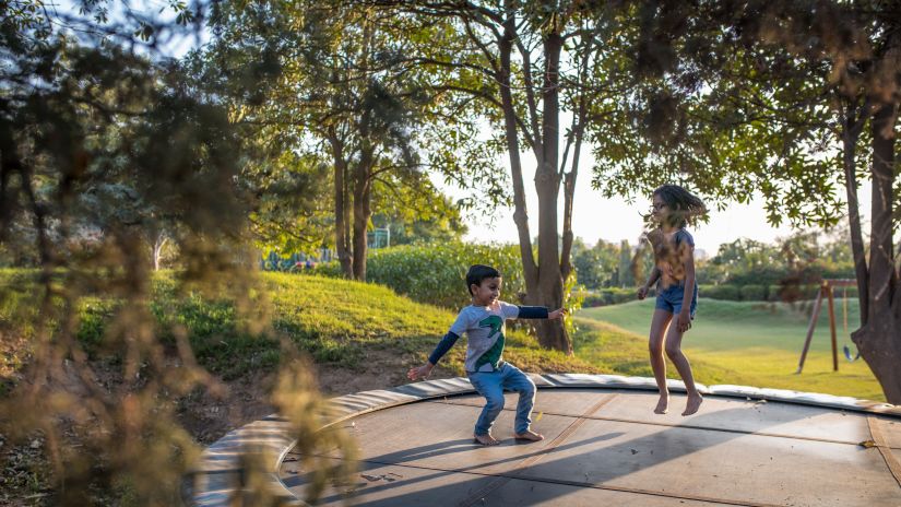 children jumping on a trampoline 132