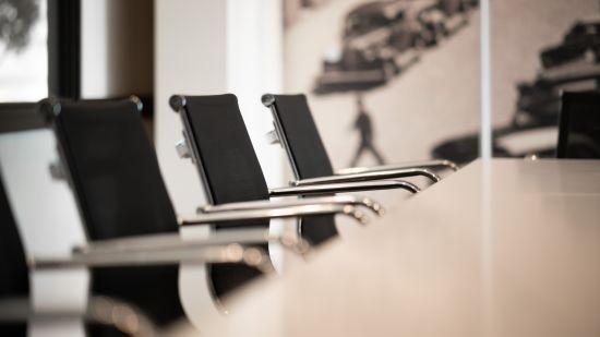 arranged chairs in a conference room