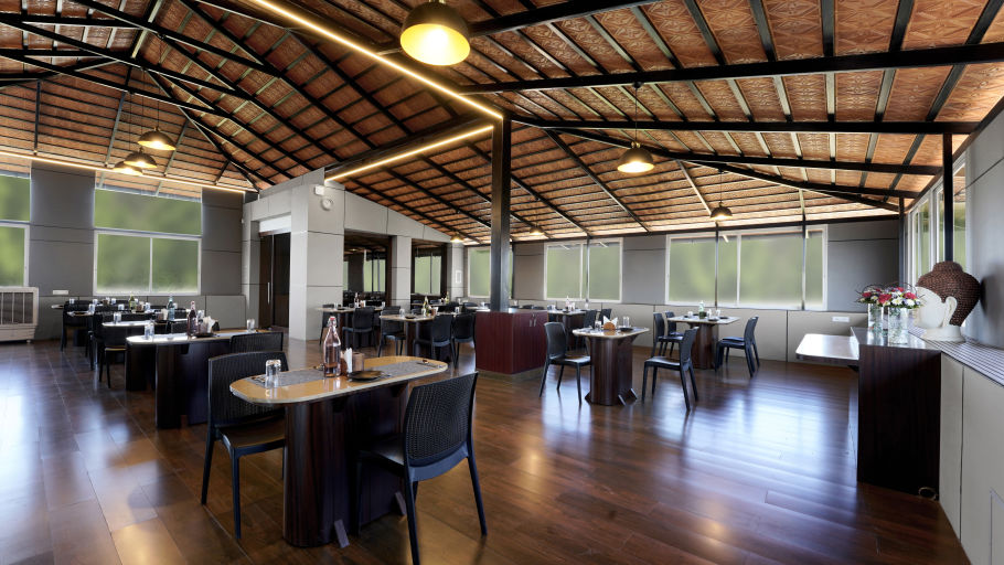 the indoor seating space at the restaurant - Hotel Gwen by Rivido, Near Bannerghatta Road