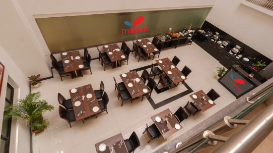 alt-text wide angle view of dining area at a restaurant - Magnus Square Viman Nagar2