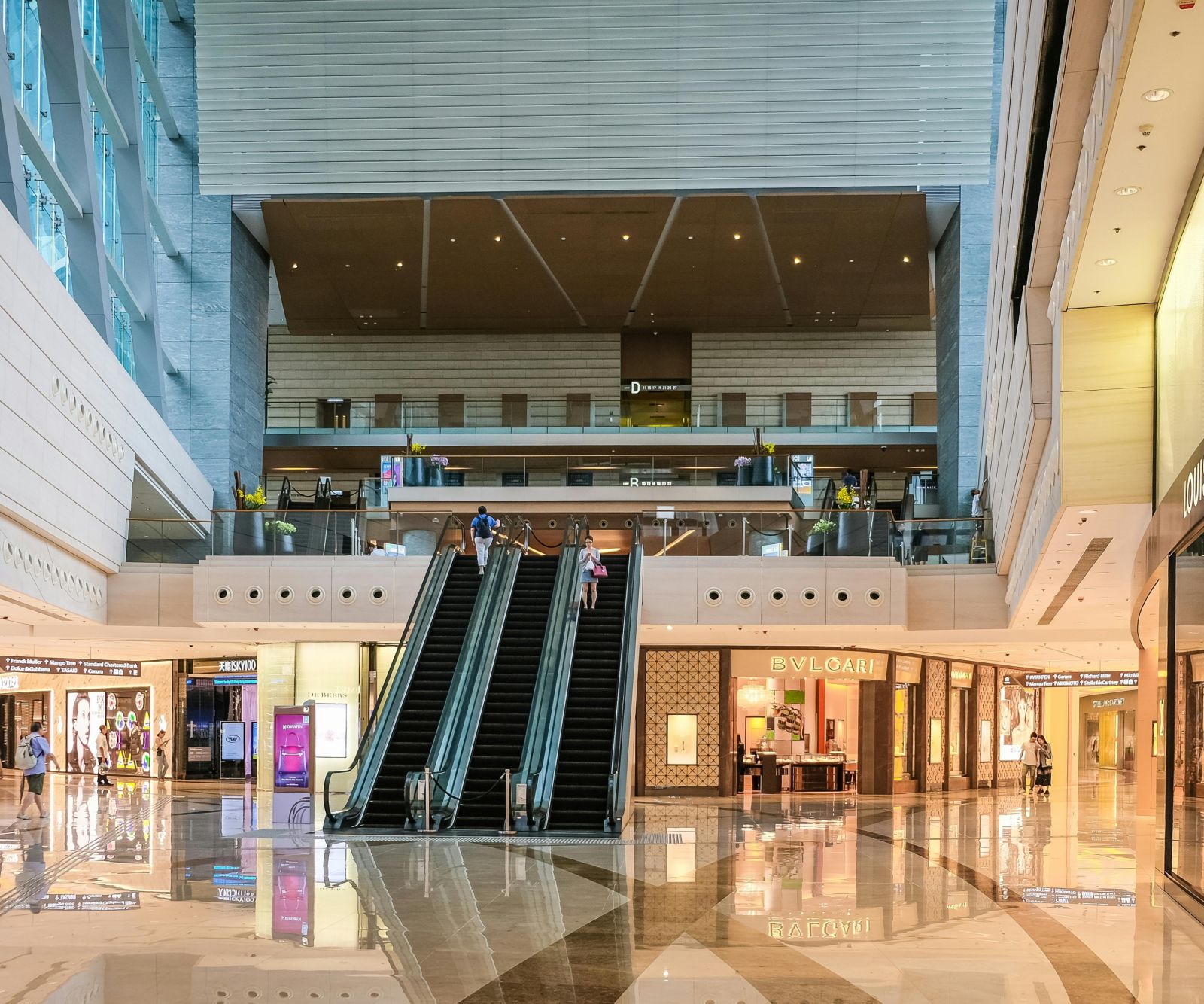 An image of a shopping mall with multiple shops