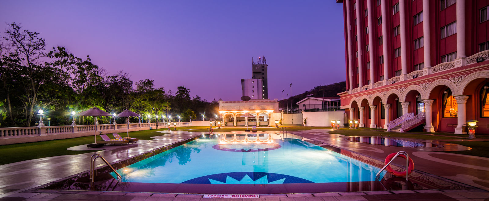 Swimming pool at Sitara Luxury Hotel during blue hour