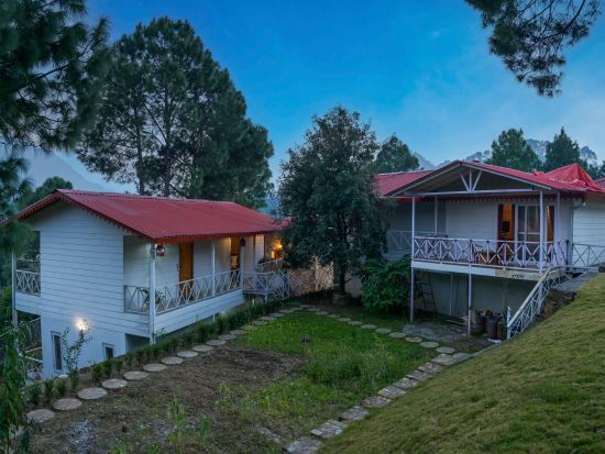 Facade of two white buildings with red roof - The Nature's Green Resort, Bhimtal