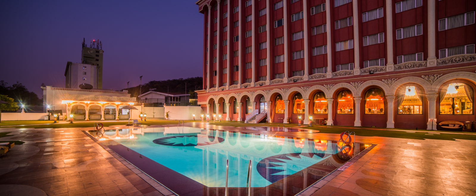 Swimming pool at Sitara Luxury Hotel in Hyderabad near Ramoji Film City during blue hour