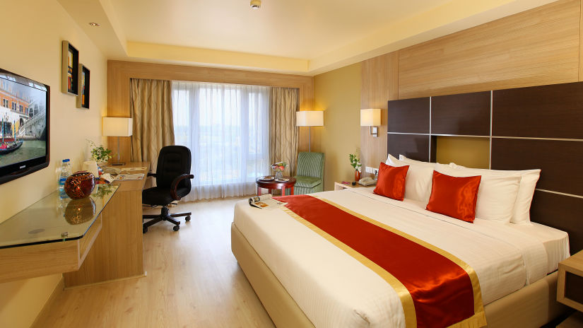 room with king size bed and elegant interiors at la classic